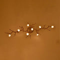 The Linear Glass Ball Branch Semi Flush Chandelier is artfully designed, it combines with the organic tree branch design, decorated with the metal leaves, creates a fruitfully ideas. it is a new interpretation for the new modern style.