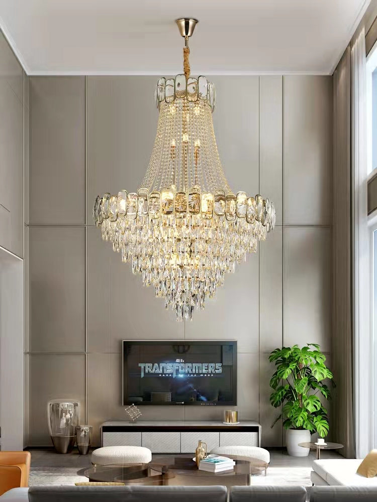 https://cdn.shopify.com/s/files/1/0736/8795/7790/files/foyer-staircase-chandelier-luxury-k9-crystal-ceiling-light-for-living-room-hallway-merlin-lamps-3.jpg?v=1765361003