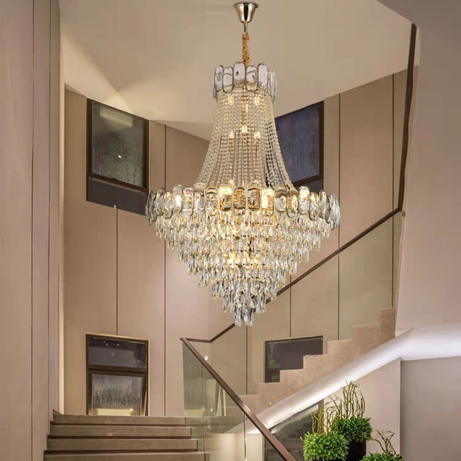 https://cdn.shopify.com/s/files/1/0736/8795/7790/files/foyer-staircase-chandelier-luxury-k9-crystal-ceiling-light-for-living-room-hallway-merlin-lamps.jpg?v=1765361000