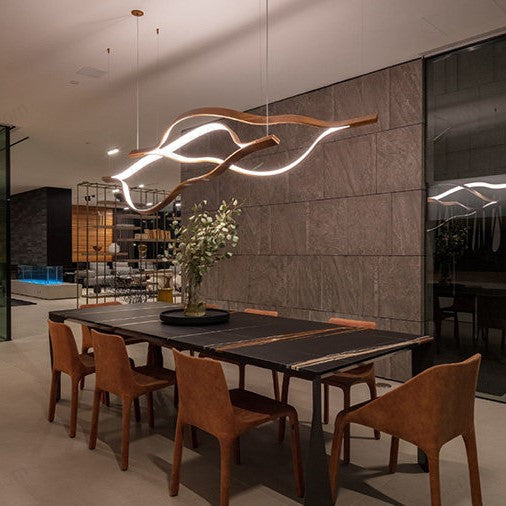 https://cdn.shopify.com/s/files/1/0736/8795/7790/files/modern-simple-brass-waving-chandelier-for-livingdining-roomkitchen-island-merlin-lamps.jpg?v=1767690874